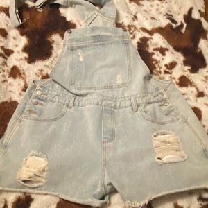 Overall shorts.